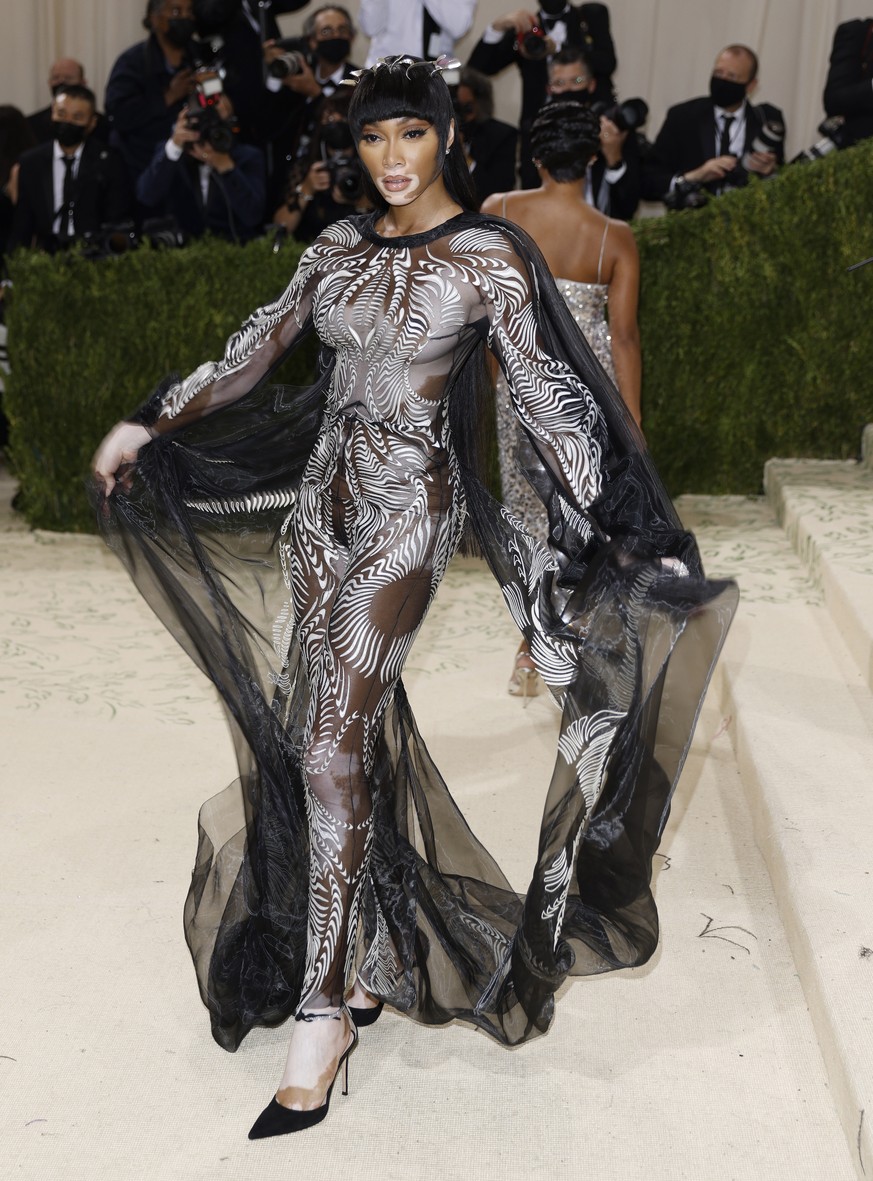 epa09466876 Winnie Harlow poses on the red carpet for the 2021 Met Gala, the annual benefit for the Metropolitan Museum of Art&#039;s Costume Institute, in New York, New York, USA, 13 September 2021.  ...