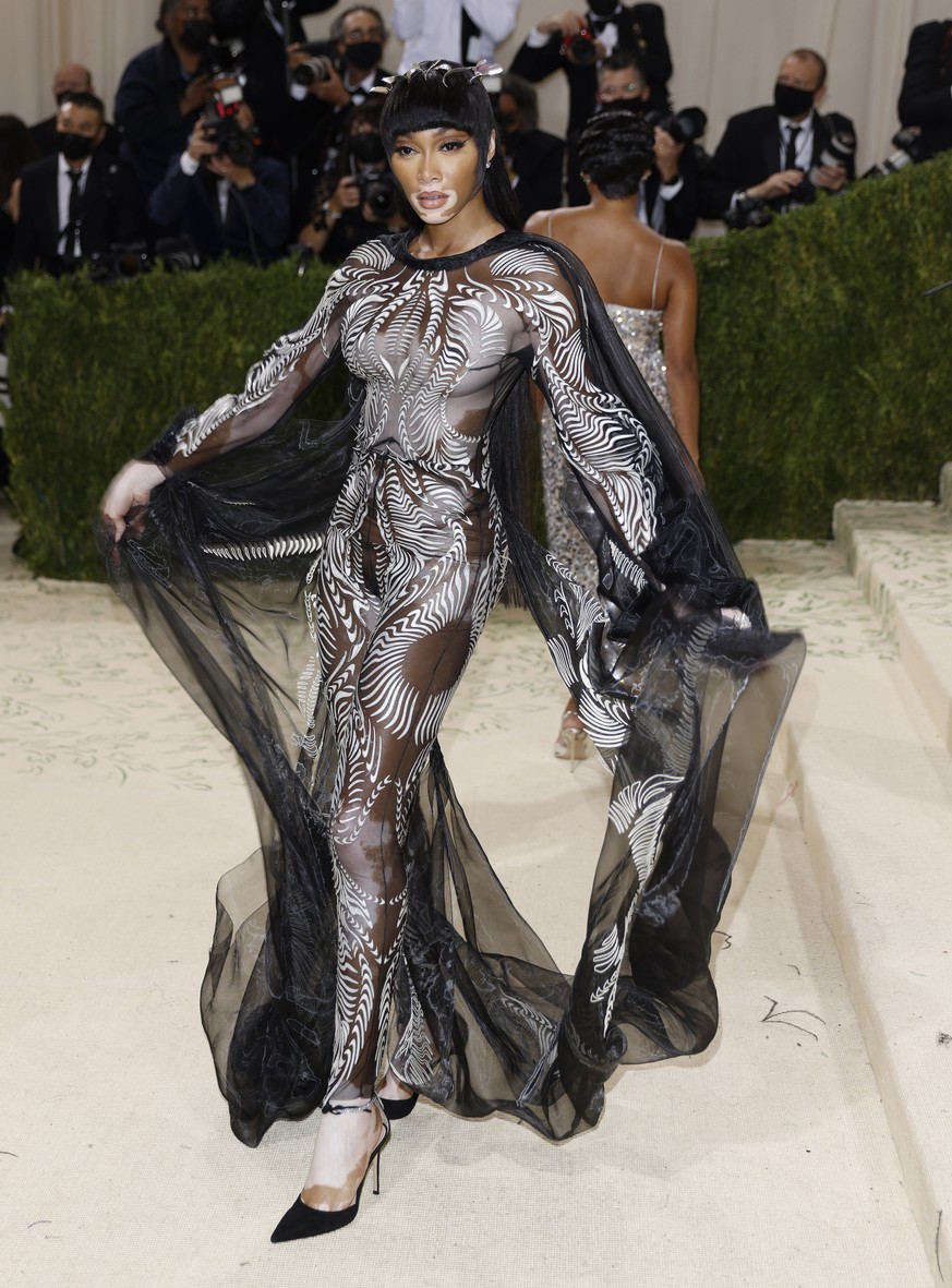 epa09466876 Winnie Harlow poses on the red carpet for the 2021 Met Gala, the annual benefit for the Metropolitan Museum of Art's Costume Institute, in New York, New York, USA, 13 September 2021. ...