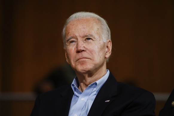 Democratic presidential candidate former Vice President Joe Biden listens to his introduction during a campaign event, Monday, Jan. 27, 2020, in Iowa City, Iowa. (AP Photo/Matt Rourke)
Joe Biden