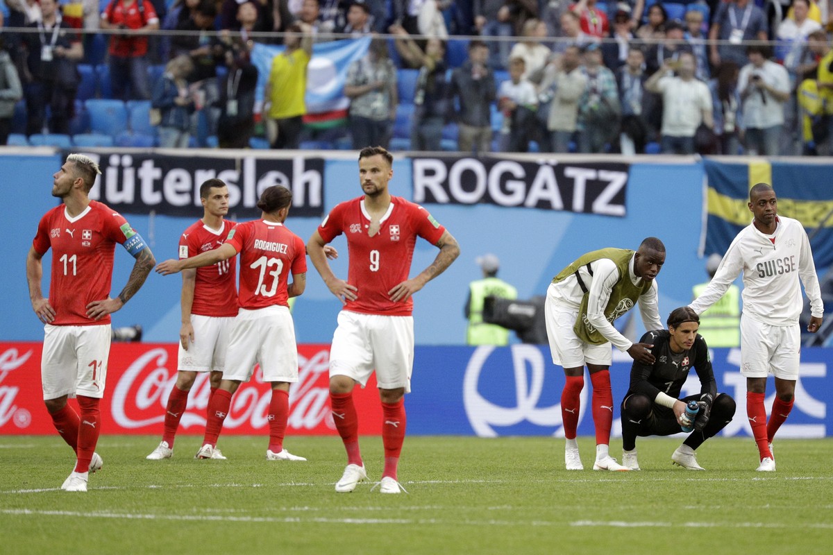 Switzerland players react after the round of 16 match between Switzerland and Sweden at the 2018 soccer World Cup in the St. Petersburg Stadium, in St. Petersburg, Russia, Tuesday, July 3, 2018. Swede ...