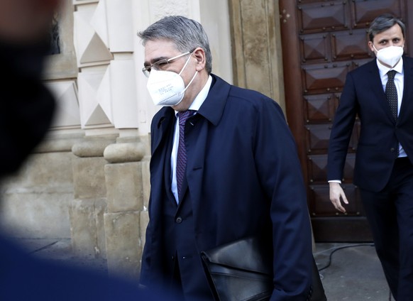 FILE - In this Wednesday, April 21, 2021 photo, Russia&#039;s ambassador to Prague, Aleksandr Zmeyevsky leaves the Foreign Ministry in Prague, Czech Republic. The Czech Foreign Ministry has summoned R ...