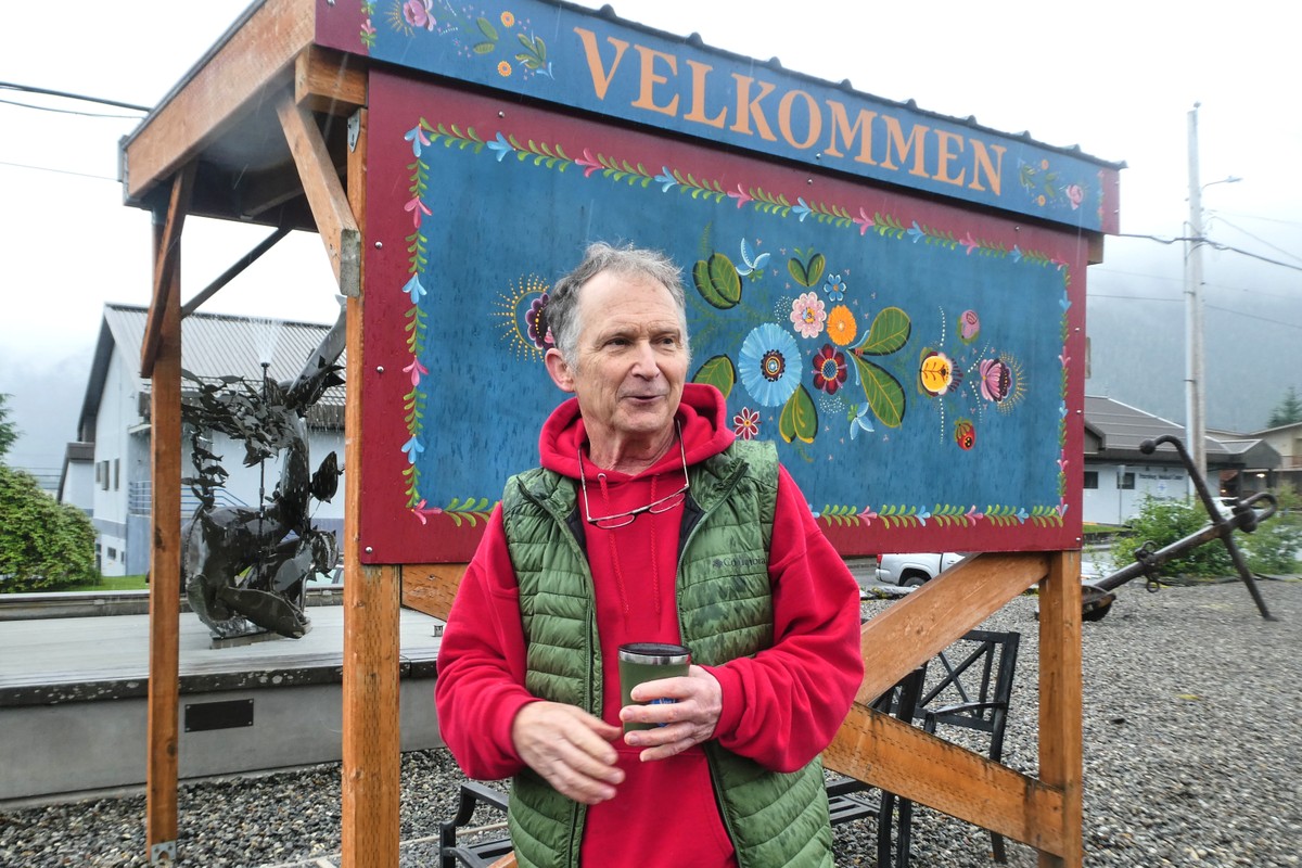 FILE - Dan J. Sullivan, a candidate in Alaska's U.S. Senate race who shares a name with the incumbent seeking reelection, talks in front of a welcome sign near downtown Petersburg, Alaska, July 3 ...