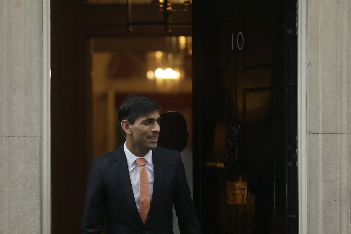 FILE - Britain's new Chancellor of the Exchequer Rishi Sunak leaves 10 Downing Street, in London, Thursday, Feb. 13, 2020. Two people are running to be Britain���s next prime minister, but a thir ...