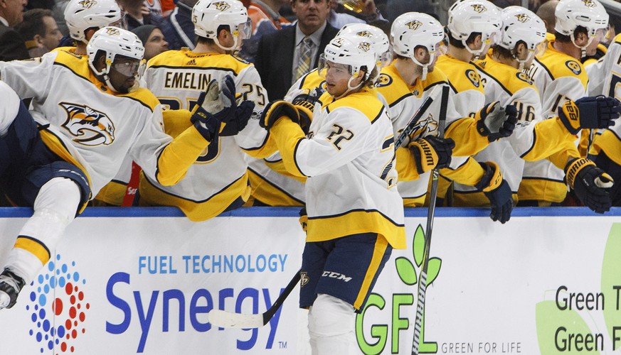 Nashville Predators&#039; Kevin Fiala (22) celebrates a goal with teammates against the Edmonton Oilers during the second period of an NHL hockey game, Thursday, Dec. 14, 2017 in Edmonton, Alberta. (J ...