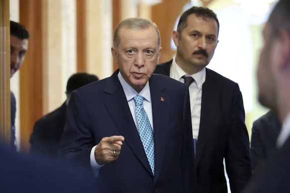 Turkish President Recep Tayyip Erdogan leaves a hall after his talks with Russian President Vladimir Putin at Russia&#039;s Black Sea resort of Sochi, Russia, Monday, Sept. 4, 2023. (Mikhail Klimentye ...