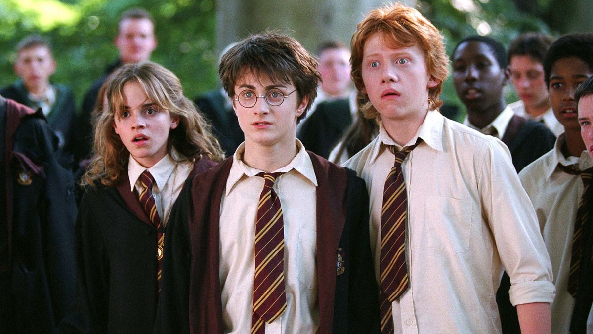 In this image released by Warner Bros., from left, Emma Watson as Hermione Granger, Daniel Radcliffe as Harry Potter and Rupert Grint as Ron Weasley are shown in a scene from "Harry Potter and th ...