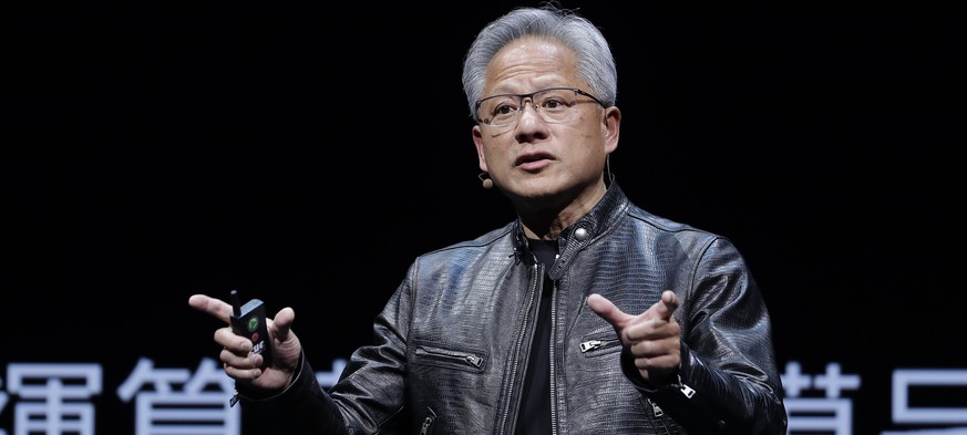 FILE - Nvidia CEO Jensen Huang speaks at the Computex 2024 exhibition in Taipei, Taiwan, June 2, 2024. Nvidia passed Microsoft on Tuesday, June 18, 2024, to become the most valuable company in the S&a ...