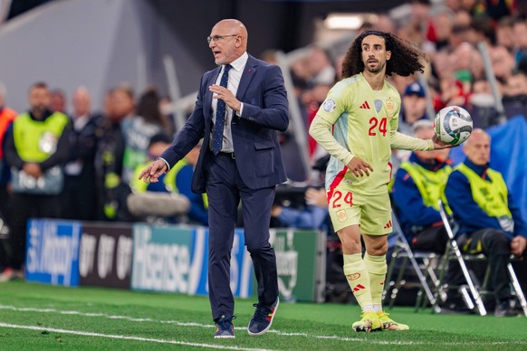 Portugal Vs Spain during the UEFA Nations League 2025 final match in Munich, Germany Luis de la Fuente L coach of Spain and Marc Cucurella R of Spain are seen during the UEFA Nations League 2025 final ...