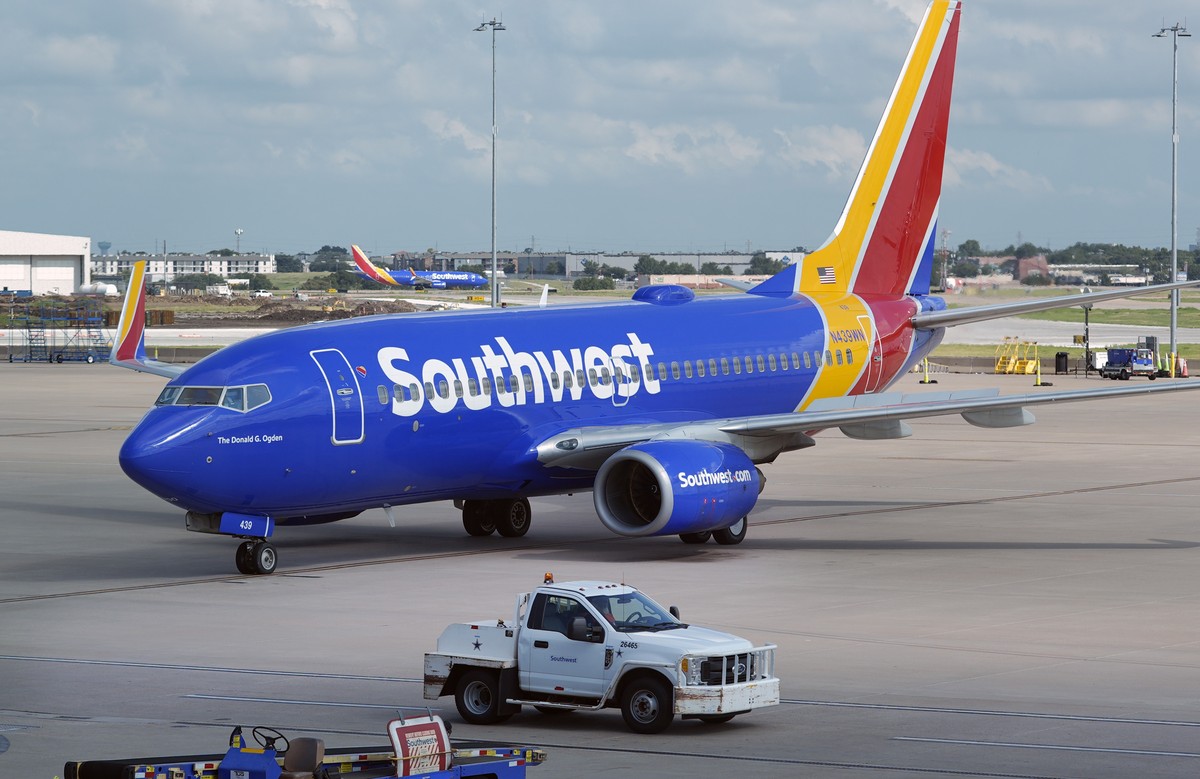 A Southwest Airlines plane moves to departs from Love Field in Dallas, Thursday, July 25, 2024. (AP Photo/LM Otero)