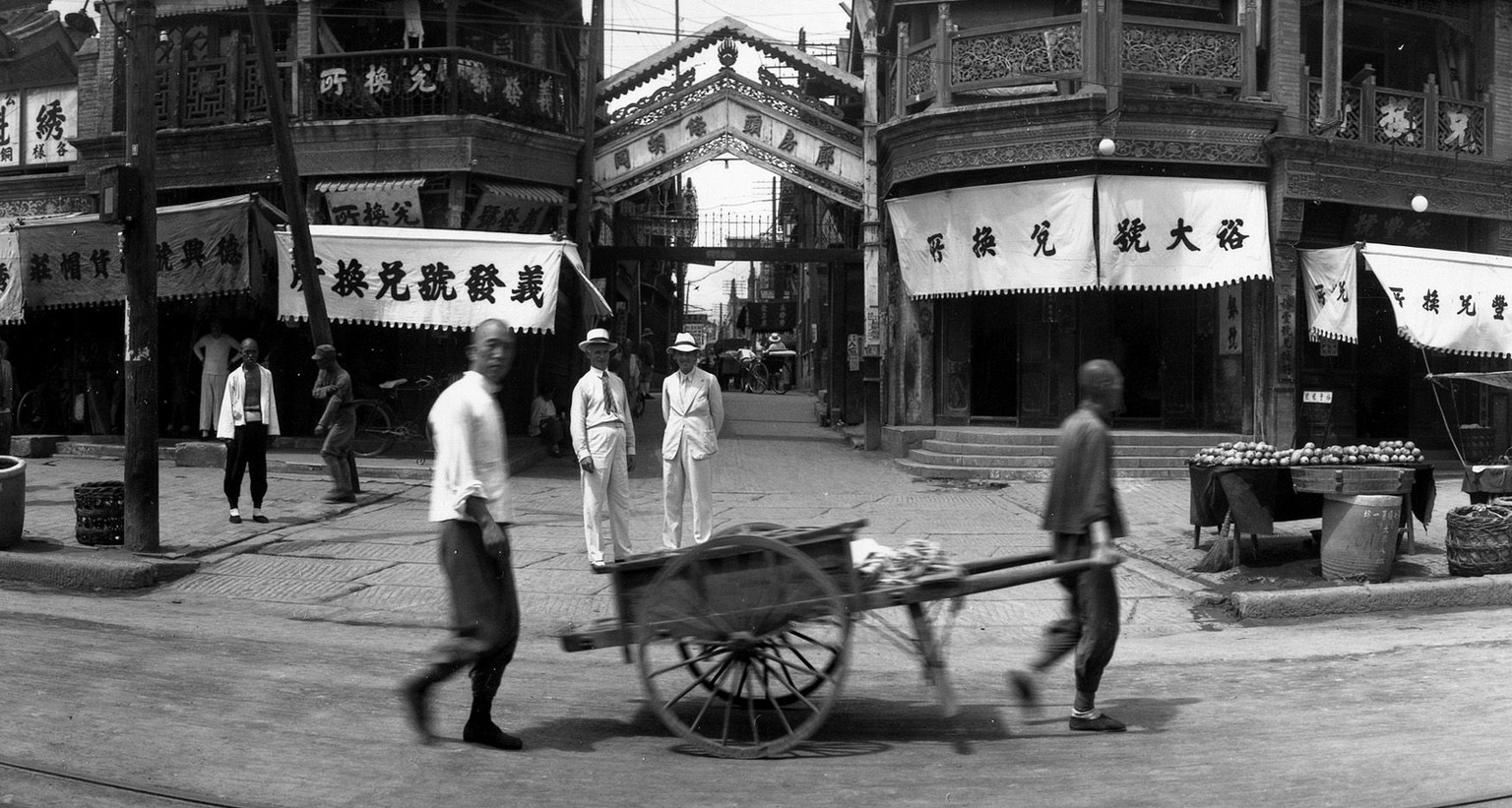 This general view shows a busy marketplace popular with tourists in Peking, China, on June 17, 1935. (AP Photo)