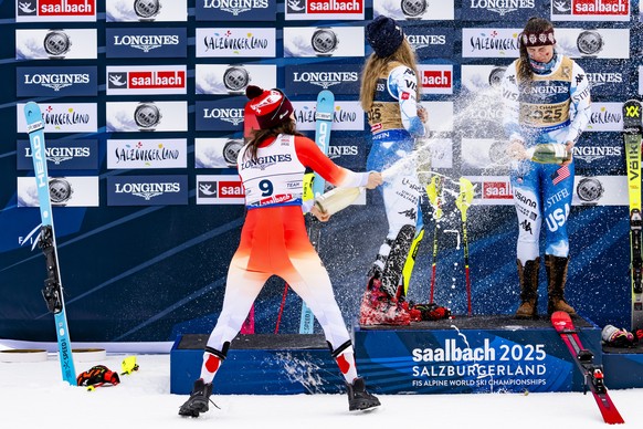 KEYPIX - Silver medalist Wendy Holdener of Switzerland, left, Gold medalists Mikaela Shiffrin of the United States and Breezy Johnson of the United States celebrate with champagne during the podium ce ...