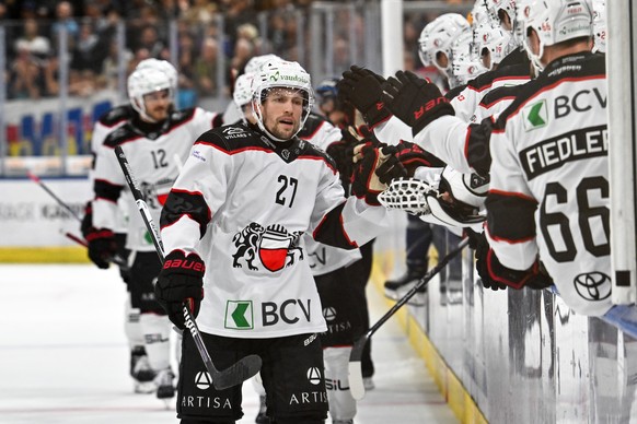 Austin Czarnik (LHC) celebrate his 0-1 goal, during the regular season of National League A (NLA) Swiss Championship 2025/26 between HC Ambri Piotta and Lausanne HC at the ice stadium Gottardo Arena,  ...