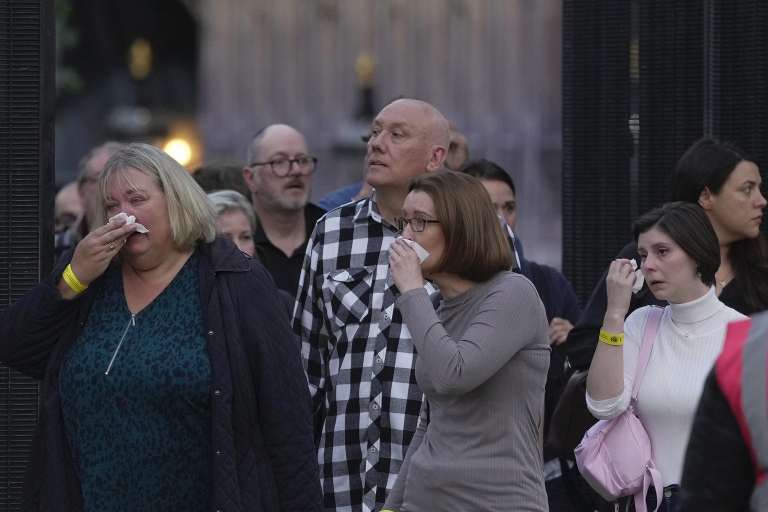 People cry as they leave the Queen Elizabeth II&#039;s lying in state in London, Wednesday Sept. 14, 2022. The Queen will lie in state in Westminster Hall for four full days before her funeral on Mond ...