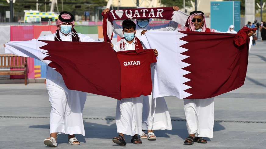 epa09618767 Fans arrive to the Education City Stadium for the FIFA Arab Cup group A soccer match between Oman and Qatar in Al-Rayyan, Qatar, 03 December 2021. EPA/Noushad Thekkayil