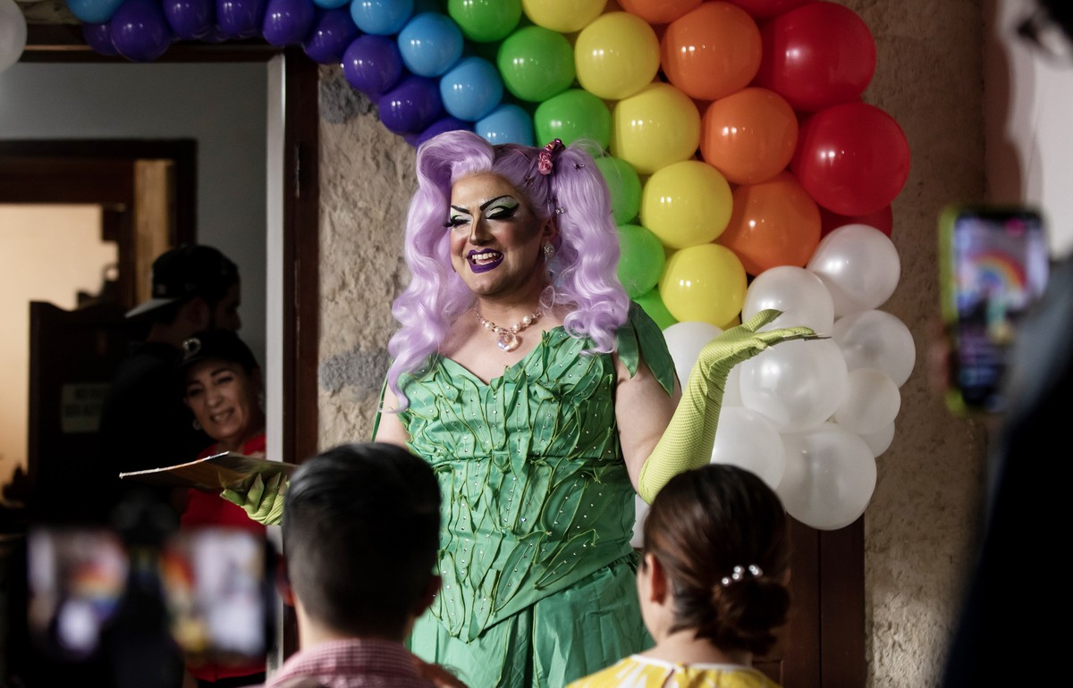 epa10601277 A member of the collective LGBTI Citizen Council of Monterrey 'Cuenti Drag' participates in Children's Day celebrations by telling stories to chuildren, in the Antiguo neigh ...
