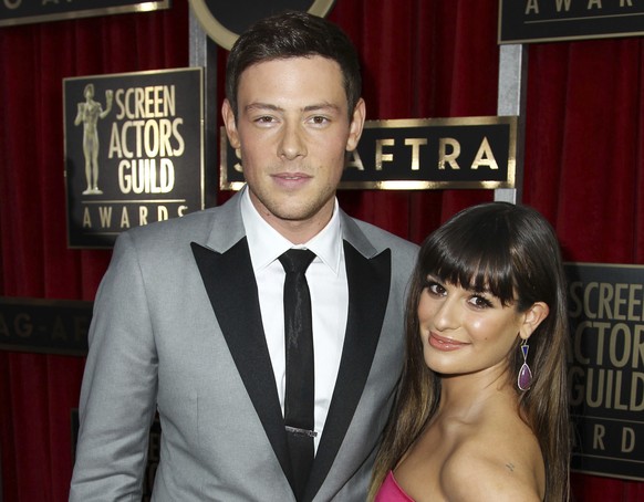 FILE - In this Jan. 27, 2013, file photo, Cory Monteith, left, and Lea Michele arrive at the 19th Annual Screen Actors Guild Awards at the Shrine Auditorium in Los Angeles. Michele and former &quot;Gl ...