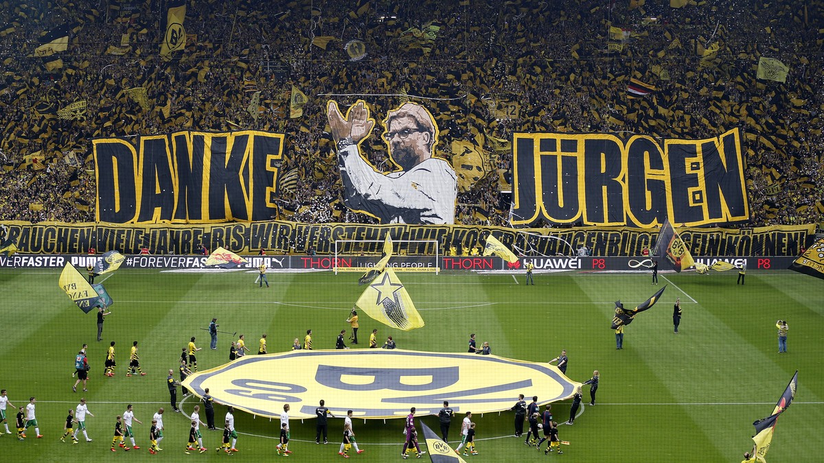 Dortmund supporters show banners to thank Dortmund's head coach Juergen Klopp prior to the German first division Bundesliga soccer match between BvB Borussia Dortmund and Werder Bremen in Dortmun ...
