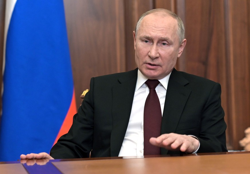 epa09776105 Russian President Vladimir Putin addresses the Russian Nation on what is happening in the Donbass and on the border with Ukraine in Moscow, Russia, 21 February 2022. The heads of the self- ...