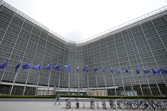 European Union flags flap in the wind outside EU headquarters in Brussels, prior to an announcement regarding Google, Thursday, July 23, 2026. (AP Photo/Virginia Mayo)
Belgium EU Google