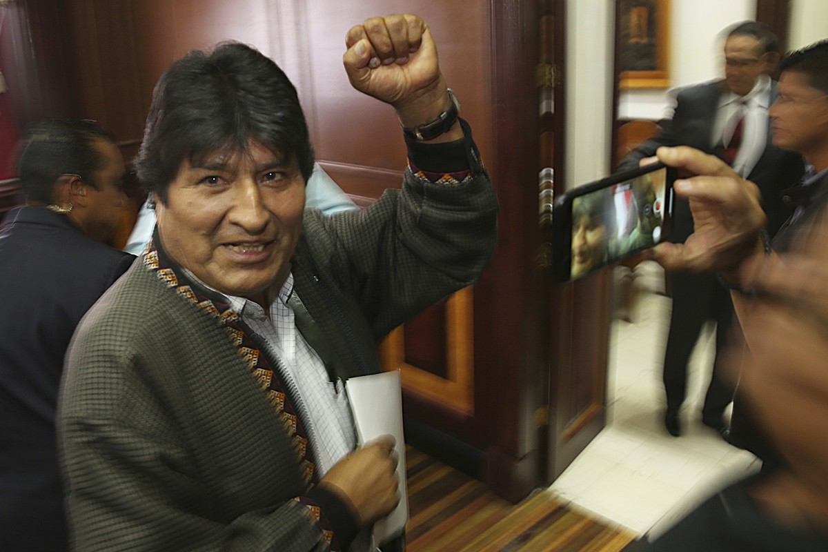 In this Nov. 27, 2019 photo, Bolivia's former President Evo Morales pumps his fist after a press conference at the journalists club in Mexico City. Morales went into exile in Mexico after he was  ...
