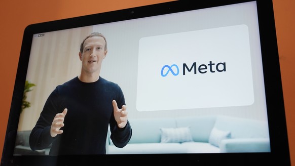 FILE - Seen on the screen of a device in Sausalito, Calif., Facebook CEO Mark Zuckerberg announces their new name, Meta, during a virtual event on Thursday, Oct. 28, 2021. Lawmakers are getting creati ...