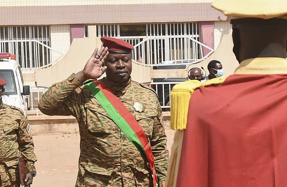 epa09763040 Lieutenant Colonel Paul-Henri Damiba is sworn in as head of state during a ceremony held in Ouagadougou, Burkina Faso, 16 February 2022. Lieutenant Colonel Paul-Henri Damiba is the leader  ...