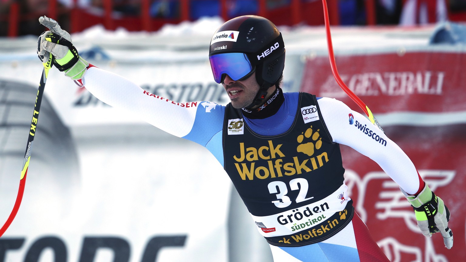 Switzerland&#039;s Gilles Roulin celebrates after completing an alpine ski, men&#039;s World Cup downhill, in Val Gardena, Italy, Saturday, Dec. 16, 2017. (AP Photo/Alessandro Trovati)
