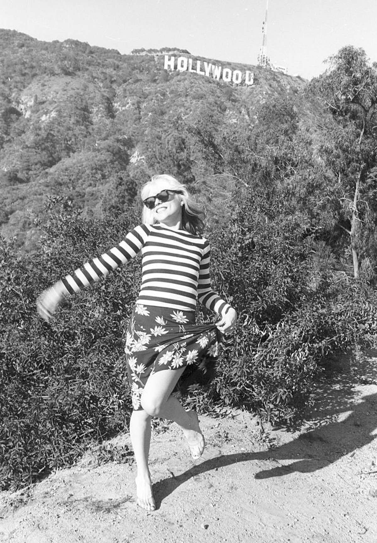 LOS ANGELES - MARCH 1977: Singer Debbie Harry of the New Wave pop group "Blondie" poses for a portrait in March 1977 on a hill beneath the Hollywood Sign in Los Angeles, California. (Photo b ...