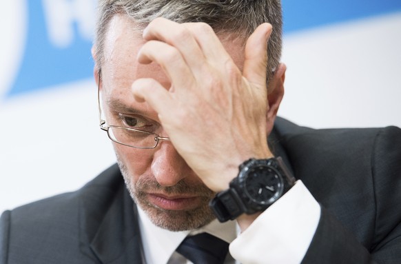 Austrian Minister of the Interior Herbert Kickl, of the right-wing Freedom Party, FPOE, addresses the media during a news conference with designated party leader and Austrian Transport Minister Norber ...