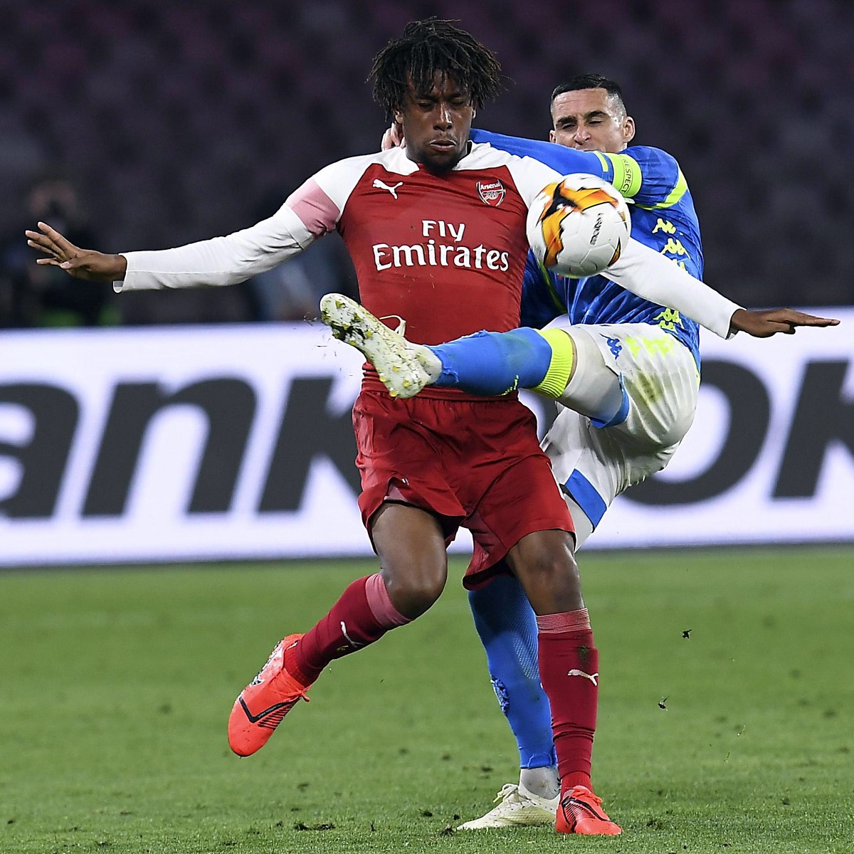 epa07514871 Napoli's Jose Callejon (R) and Arsenal's Alex Iwobi in action during the UEFA Europa League quarterfinal, second leg soccer match between SSC Napoli and Arsenal FC at the San Pao ...