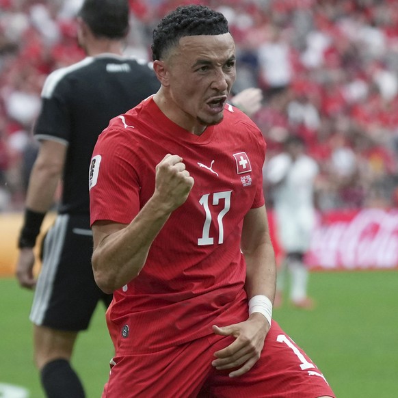 Switzerland's Ruben Vargas (17) celebrates after scoring during the World Cup Group B soccer match between Switzerland and Canada in Vancouver, British Columbia, Wednesday, June 24, 2026. (AP Pho ...