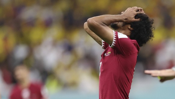 221120 -- AL KHOR, Nov. 20, 2022 -- Akram Afif of Qatar reacts during the Group A match between Qatar and Ecuador at the 2022 FIFA World Cup, WM, Weltmeisterschaft, Fussball at Al Bayt Stadium in Al K ...