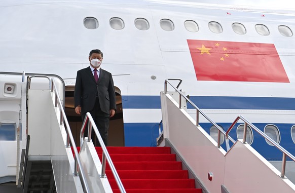 epa10183166 Chinese President Xi Jinping leaves his aircraft after arriving to the airport in Nur-Sultan, Kazakhstan, 14 September 2022. Jinping is on a one-day working visit to Kazakhstan. EPA/KAZAKH ...