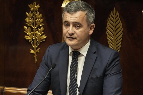 French Interior Minister Gerald Darmanin delivers a speech at the French National Assembly in Paris, Monday, dec. 11, 2023. A divisive migration bill that would speed up deportations reaches the lower ...