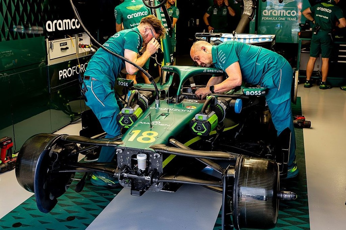 Mechanics work on the car of Formula 1 driver Lance Stroll of the Aston Martin Aramco Formula 1 Team during the Formula 1 Melbourne free practice session at Albert Park in Melbourne, Australia, on Mar ...