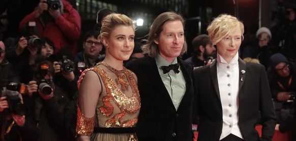 Director Wes Anderson, center, poses with actresses Tilda Swinton, right, and Greta Gerwig, left, on the red carpet for the film &#039;Isle of Dogs&#039; during the 68th edition of the International F ...