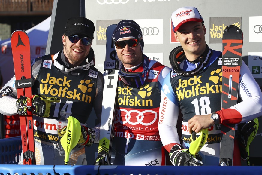 France&#039;s Alexis Pinturault, center, winner of an alpine ski, men&#039;s World Cup combined, poses with second placed Norway&#039;s Aleksander Aamodt Kilde, left, and third placed Switzerland&#039 ...