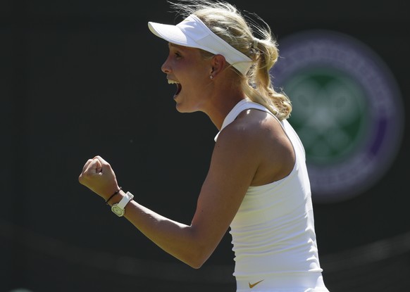 Donna Vekic of Croatia celebrates winning match point and defeating Sloane Stephens of the US in the Women&#039;s Singles first round match at the Wimbledon Tennis Championships in London, Monday July ...