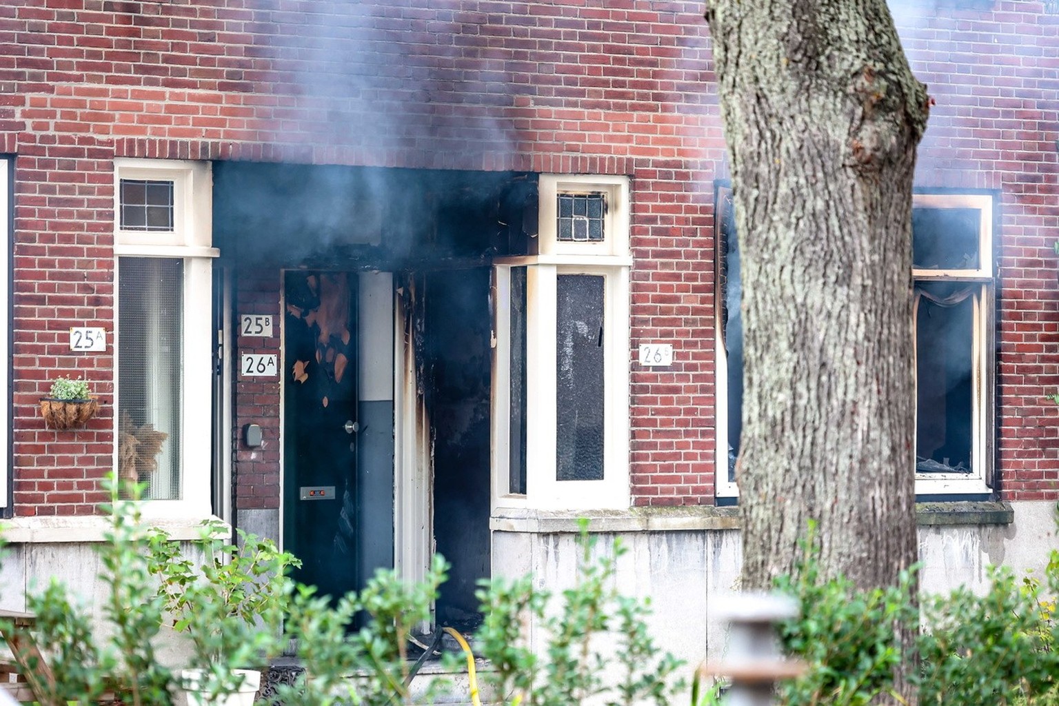 epa10888202 A fire in a building on Heiman Dullaertplein in Rotterdam, Netherlands, 28 September 2023. There have been two shooting incidents in Rotterdam that injured two people: at a house on Heiman ...