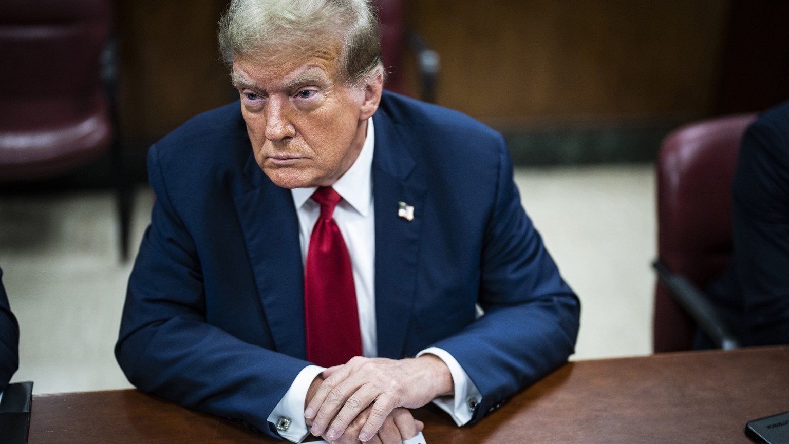 Former President Donald Trump sits inside a Manhattan criminal court with his legal team on the first day of jury selection, in New York, April 15, 2024. (Photo by Jabin Botsford/Washington Post via A ...