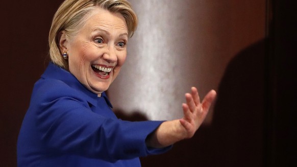FILE - In this Monday, Jan. 7, 2019, file photo, former Secretary of State Hillary Clinton waves to well-wishers following an appearance at Barnard College with New York Gov. Andrew Cuomo, in New York ...