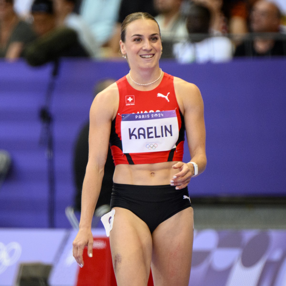 Annik Kaelin of Switzerland reacts after the women's heptathlon 100m hurdles at the 2024 Paris Summer Olympics in Paris, France, Thursday, August 8, 2024. (KEYSTONE/Laurent Gillieron)