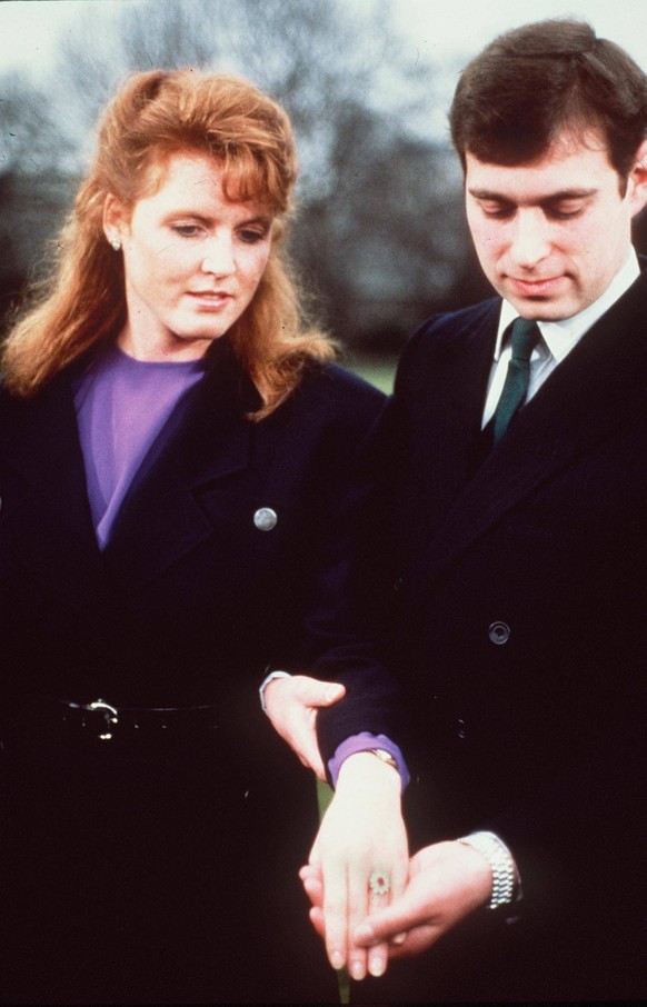 HRH PRINCE ANDREW with his fiancee SARAH FERGUSON At Buckingham Palace on the day they announced their engagement COMPULSORY CREDIT: UPPA/Photoshot Photo CUE 206499 19.03.1986 HRH PRINCE ANDREW with h ...