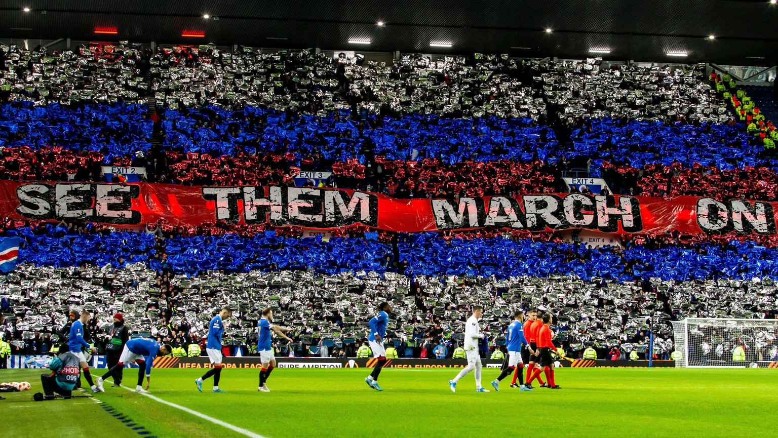 IMAGO / Shutterstock

Mandatory Credit: Photo by Luke Nickerson/Rangers FC/Shutterstock (12821152aj) Rangers fan display as the players walk out Rangers v Borussia Dortmund, UEFA Europa League, Play-o ...