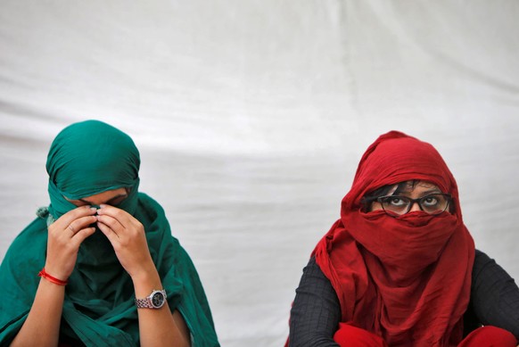 Rape victims participate in a sit-in protest demanding justice or a right to death and hard punishment to the rapists, according to a media release, in New Delhi, India May 10, 2016. REUTERS/Anindito  ...