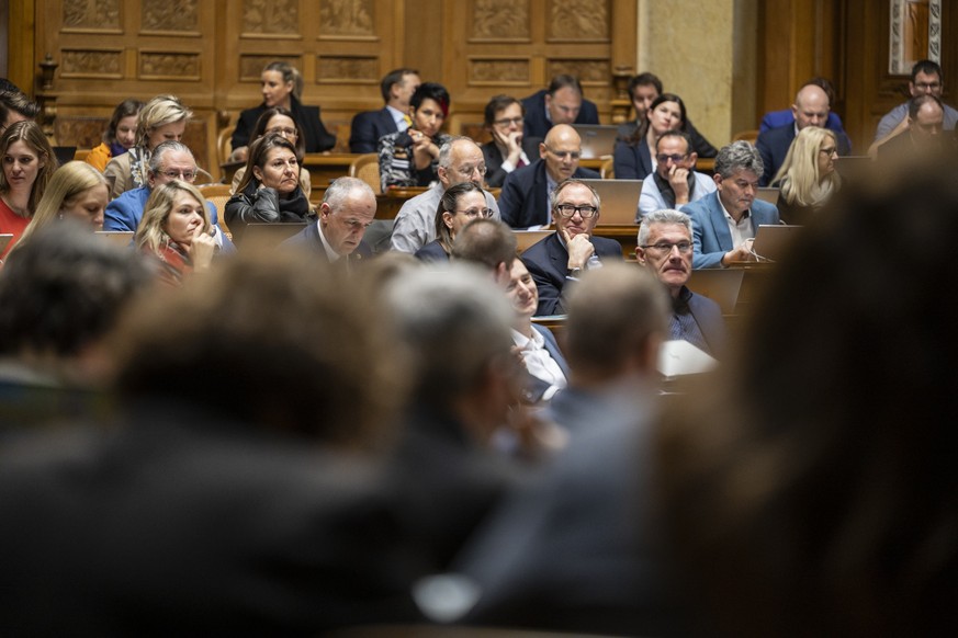 Die Mitglieder des Rates stimmen ab, Blick in Richtung der rechten Ratsseite, an der Fruehjahrssession der Eidgenoessischen Raete, am Dienstag, 7. Maerz 2023 im Nationalrat in Bern. (KEYSTONE/Alessand ...