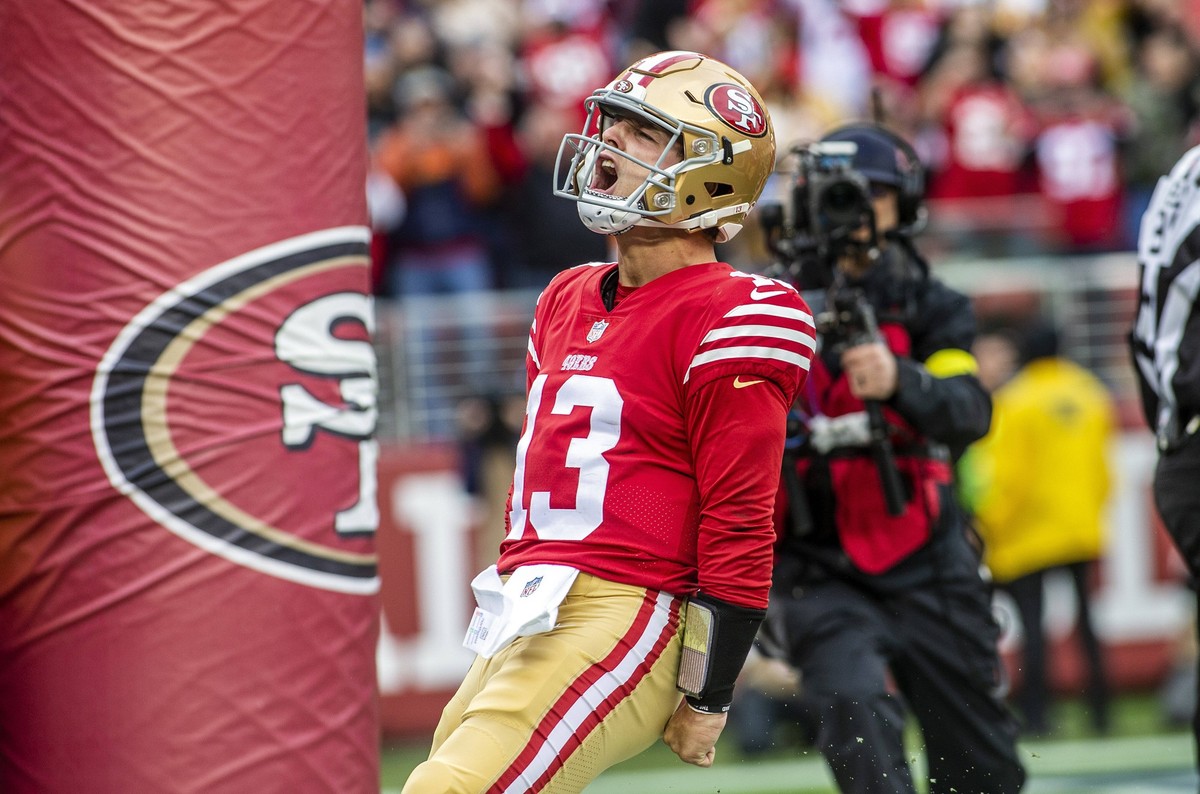 SANTA CLARA, CA - DECEMBER 11: San Francisco 49ers quarterback Brock Purdy 13 celebrates a touchdown in the second quarter of an NFL, American Football Herren, USA game between the San Francisco 49ers ...