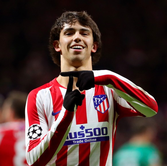 epa08063535 Atletico Madrid's Joao Felix celebrates after converting a penalty during the UEFA Champions League group stage soccer match between Atletico Madrid and FC Lokomotiv Moscow at the Wan ...