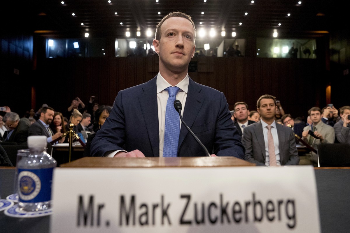 Facebook CEO Mark Zuckerberg arrives to testify before a joint hearing of the Commerce and Judiciary Committees on Capitol Hill in Washington, Tuesday, April 10, 2018, about the use of Facebook data t ...