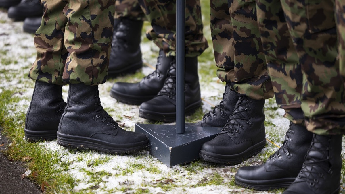 Soldiers of the Swiss army prepare for the ceremony prior to the arrival of Swiss President Viola Amherd and the Prime Minister of the People's Republic of China, Li Qiang, in Kehrsatz near Bern, ...